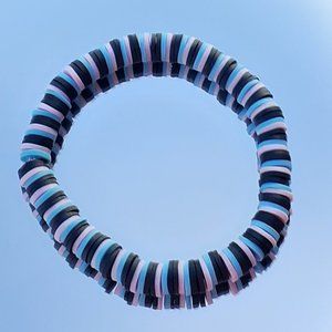 Clay bead stretchy string bracelet When you buy 2 you get 1 free bracelet!